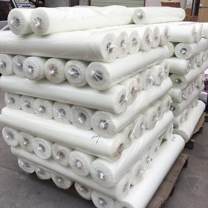 Square 4 * 4mm Putih Kaca Serat Jaring Serat Kaca Plaster Mesh Roll Untuk Isolasi Dinding Dan Perbaikan